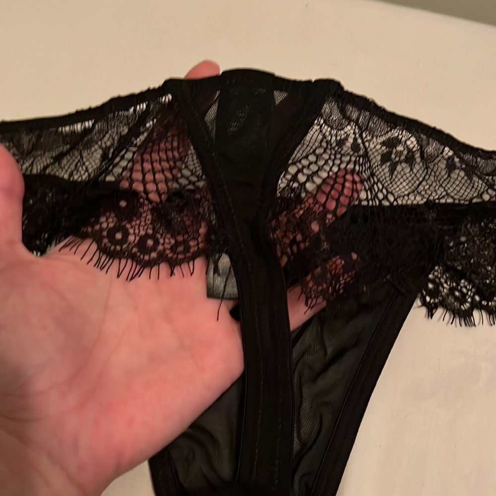 Mostly black lace, sheer coverage to front area. Thin thong area. - Picture 7 of 8